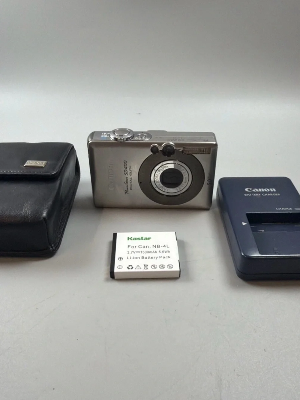 Canon Silver Digital SD400 Point-and-Shoot Camera with Charger and Battery
